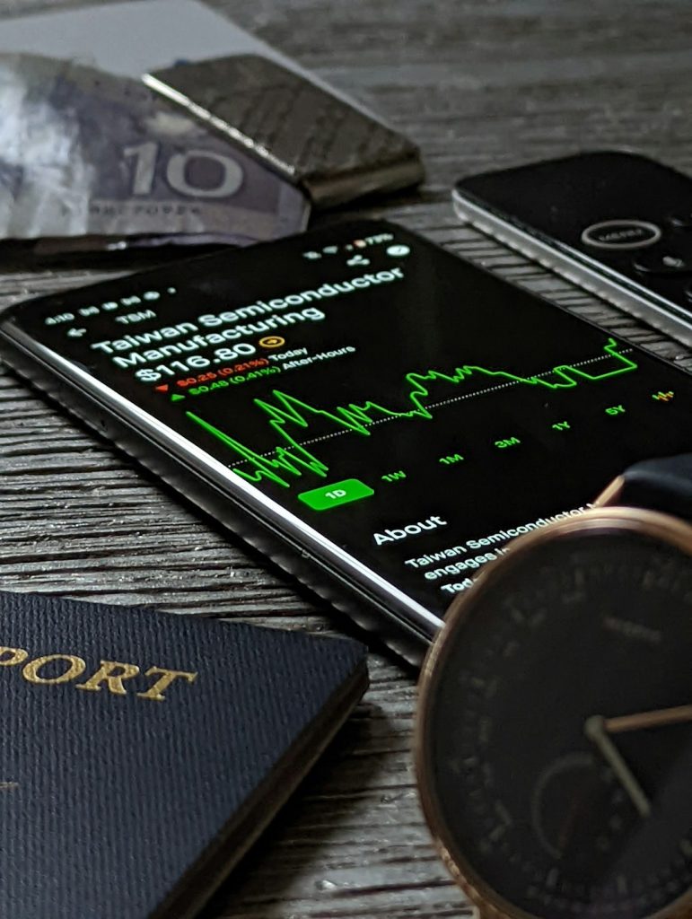 Crafting Captivating Headlines: Your awesome post title goes here Blockchain Trading Application Displays Information for Taiwan Semiconductor, American Passport, Misfit Watch, Apple TV Remote, and Money Clip with Canadian Money.